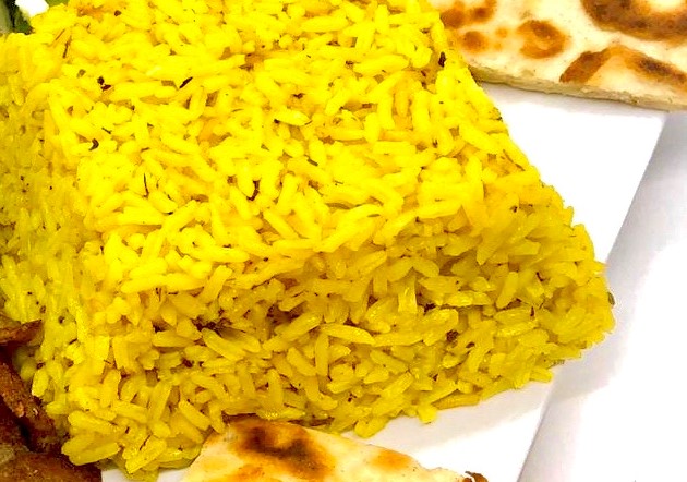 Order Yellow Rice food online from Rosemary Grill store, Gibsonton on bringmethat.com