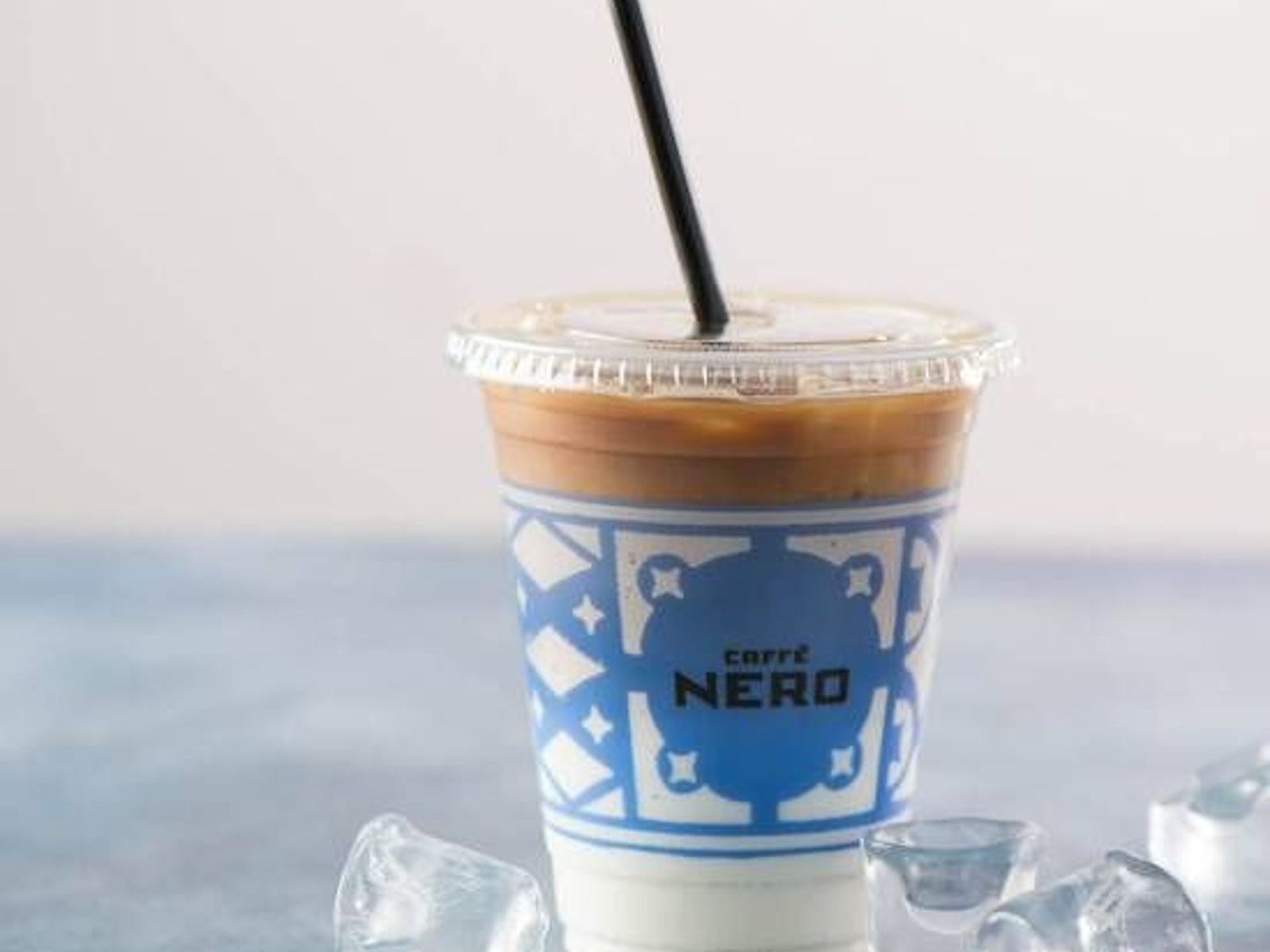 Order Iced Latte (16oz) food online from Caffe Nero store, Darien on bringmethat.com