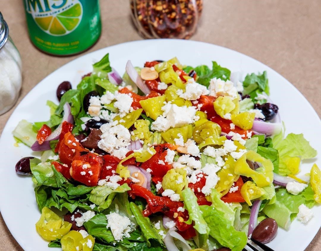 Order Greek Salad - Small food online from Planet Pizza store, Ridgefield on bringmethat.com
