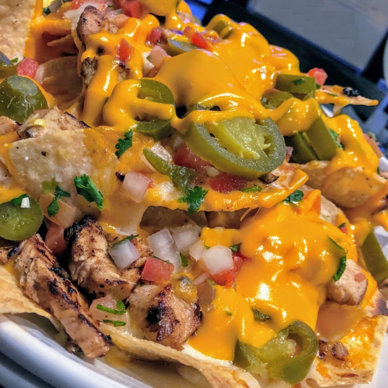 Order Nachos food online from Jimmy E Bar + Grill store, Signal Hill on bringmethat.com