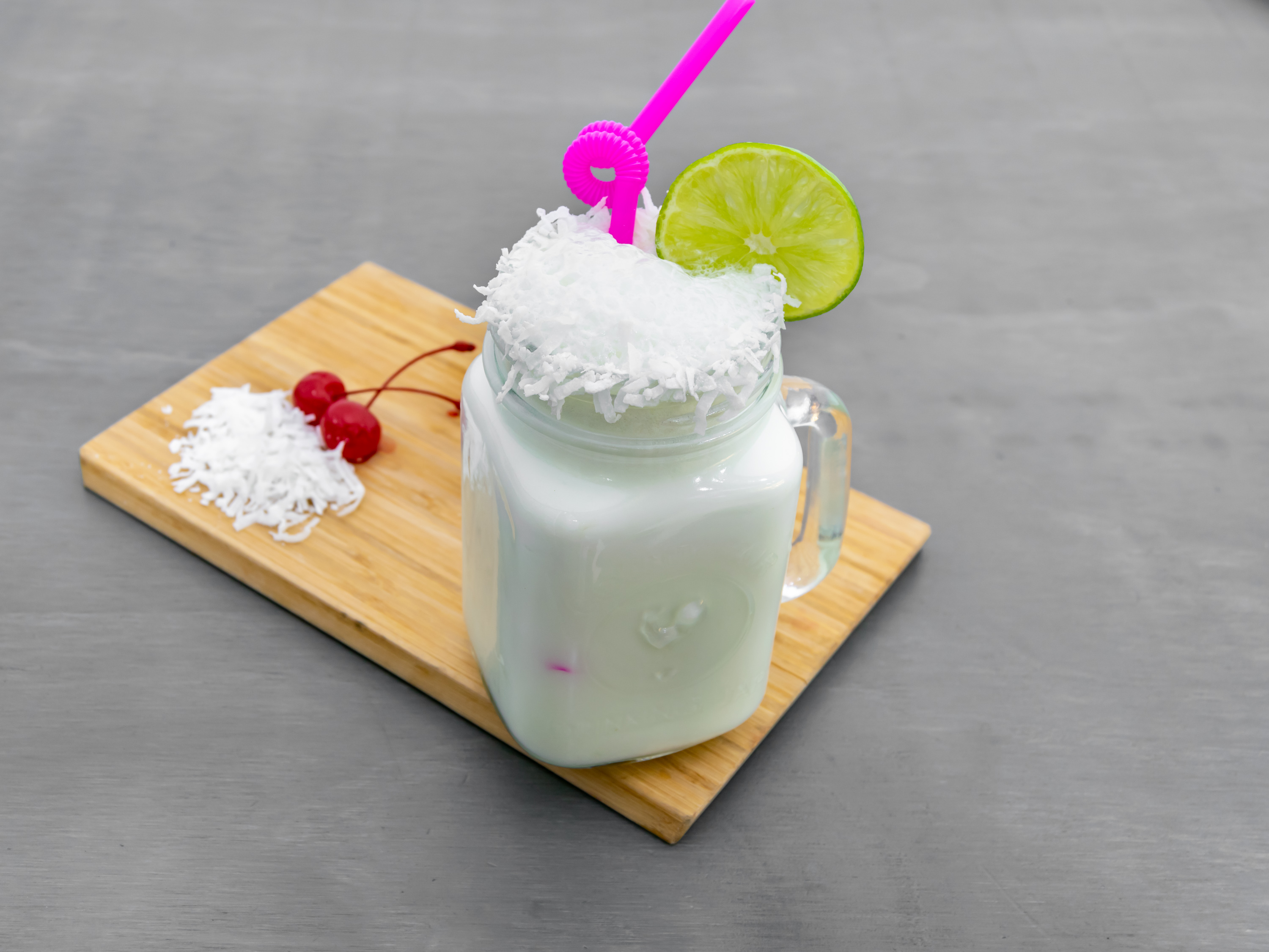 Order Limonada de Coco food online from Monchys Colombian Grill store, Dover on bringmethat.com