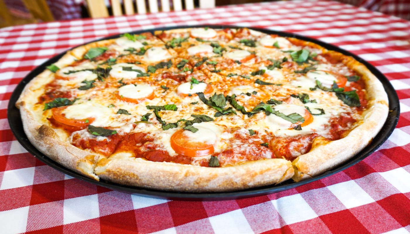 Order Margherita Pizza - 12" food online from Po Po Trattoria Pizzeria store, San Antonio on bringmethat.com