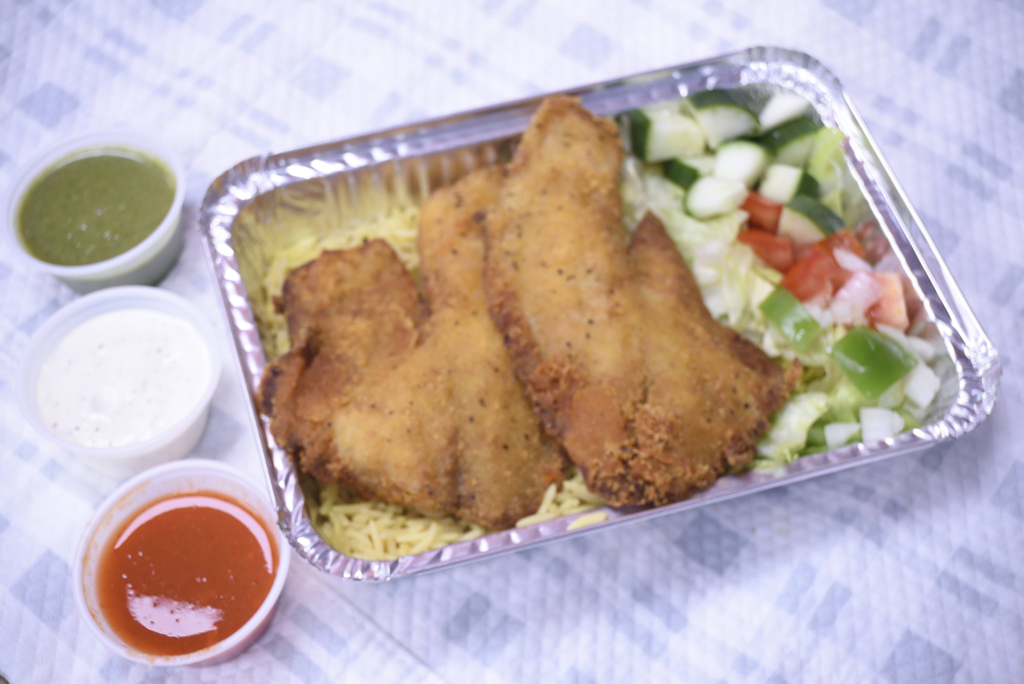 Order 8. Fish over Rice food online from Bucks Gyro Food Truck store, Warminster on bringmethat.com