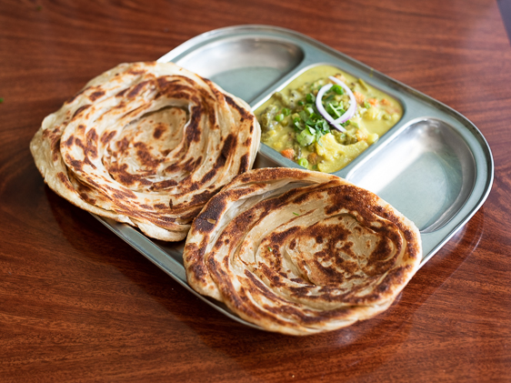 Order Malabar Paratha food online from Dosa Place store, Fremont on bringmethat.com