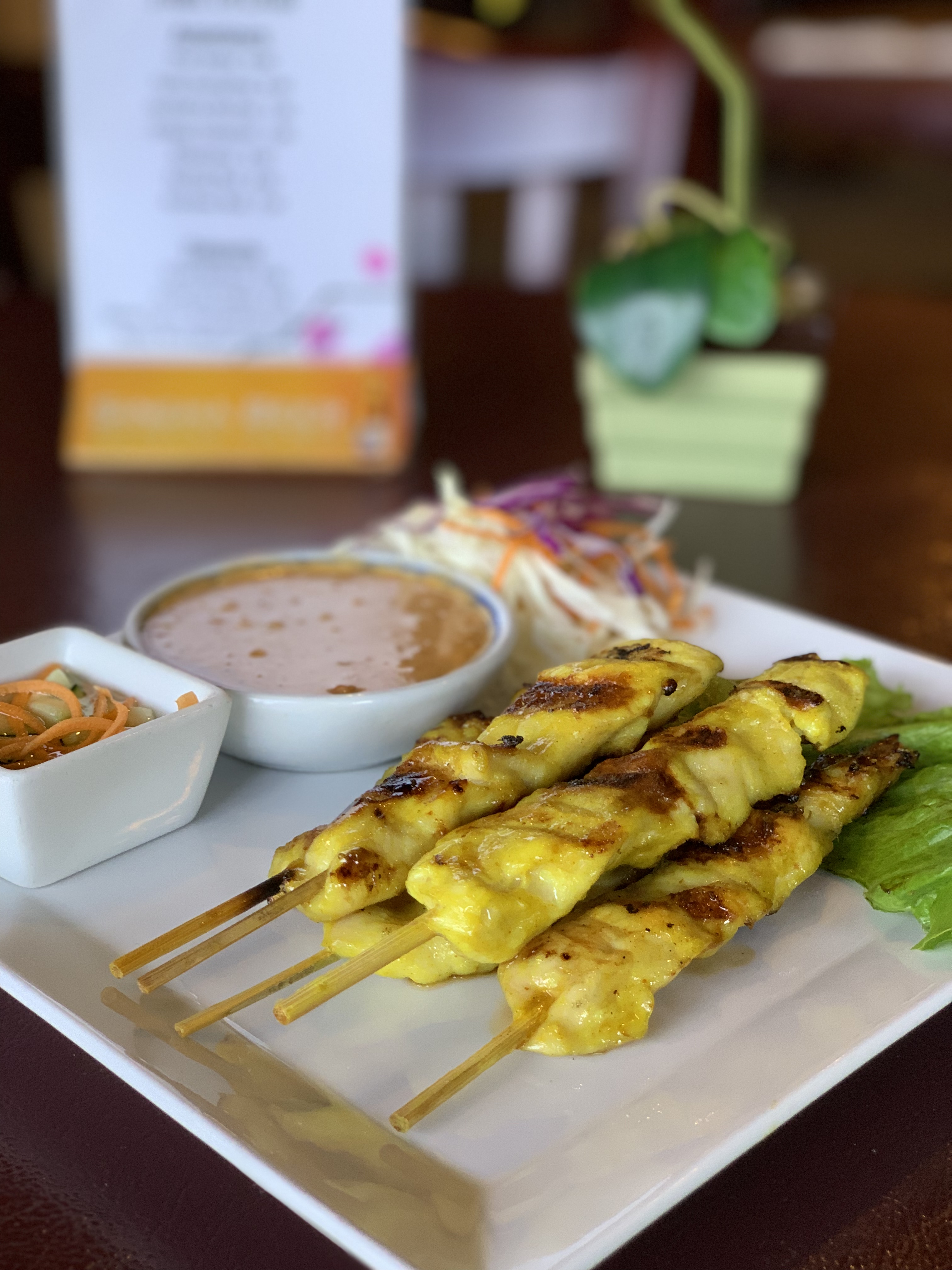 Order Satay Chicken (4 pcs) food online from Thai Orchid Restaurant store, ADDISON on bringmethat.com