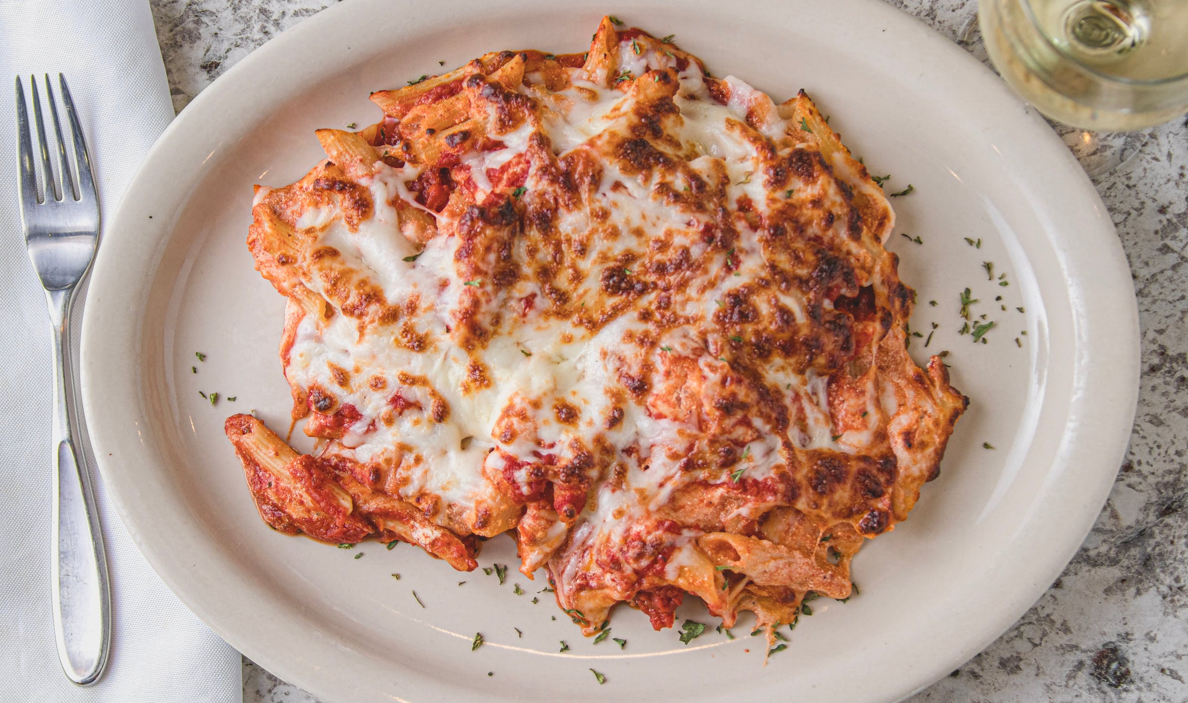 Order Baked Ziti Catering - Half Pan (Serves 8 People) food online from Mario Pizza & Pasta store, Seabrook on bringmethat.com