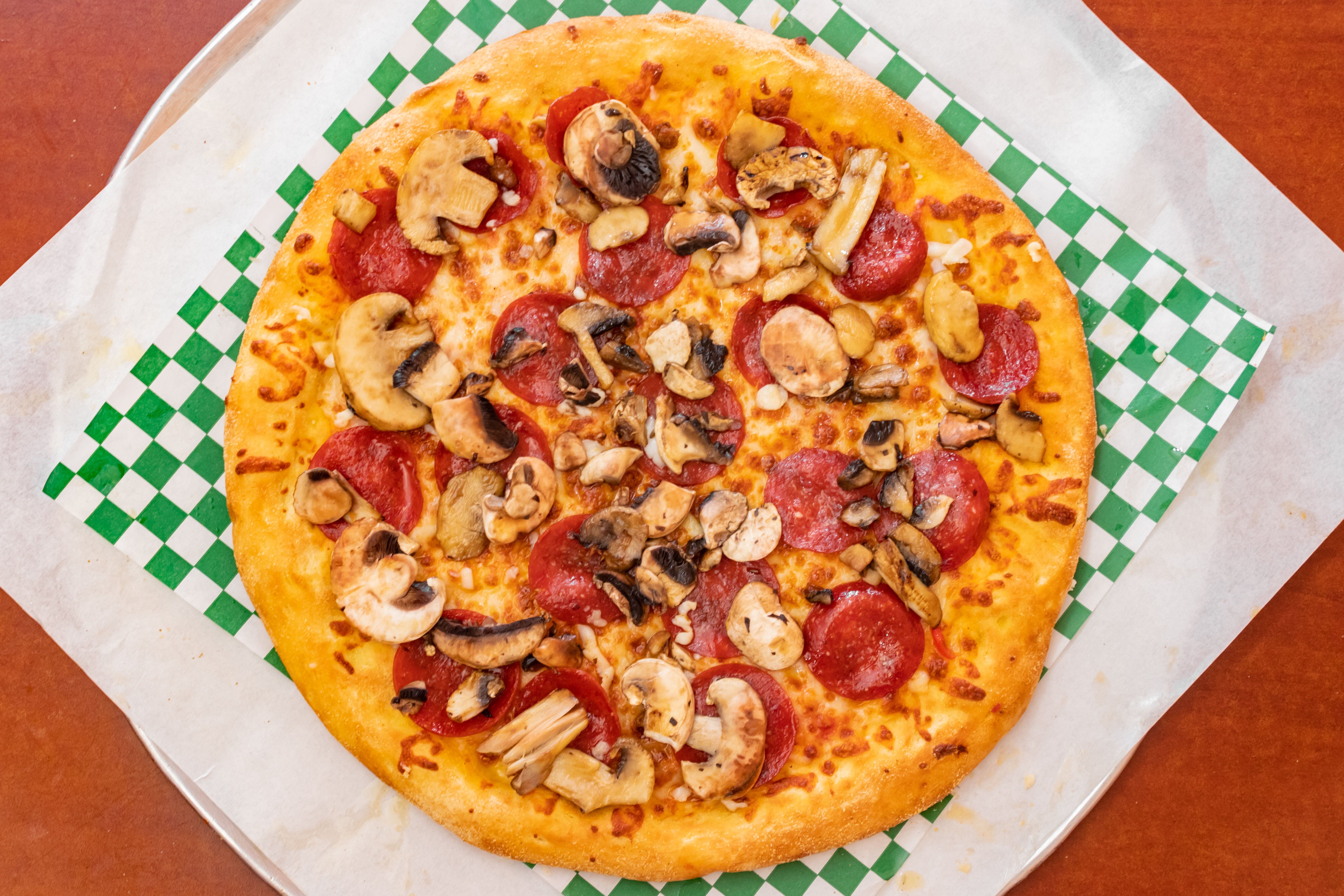 Order 8. Pepperoni & Mushroom Pizza Slice - Slice food online from Tarboosh store, San Francisco on bringmethat.com