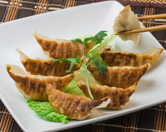 Order A5. Fried Pork Dumplings food online from Egg Rolls Chinese Cafe store, Houston on bringmethat.com