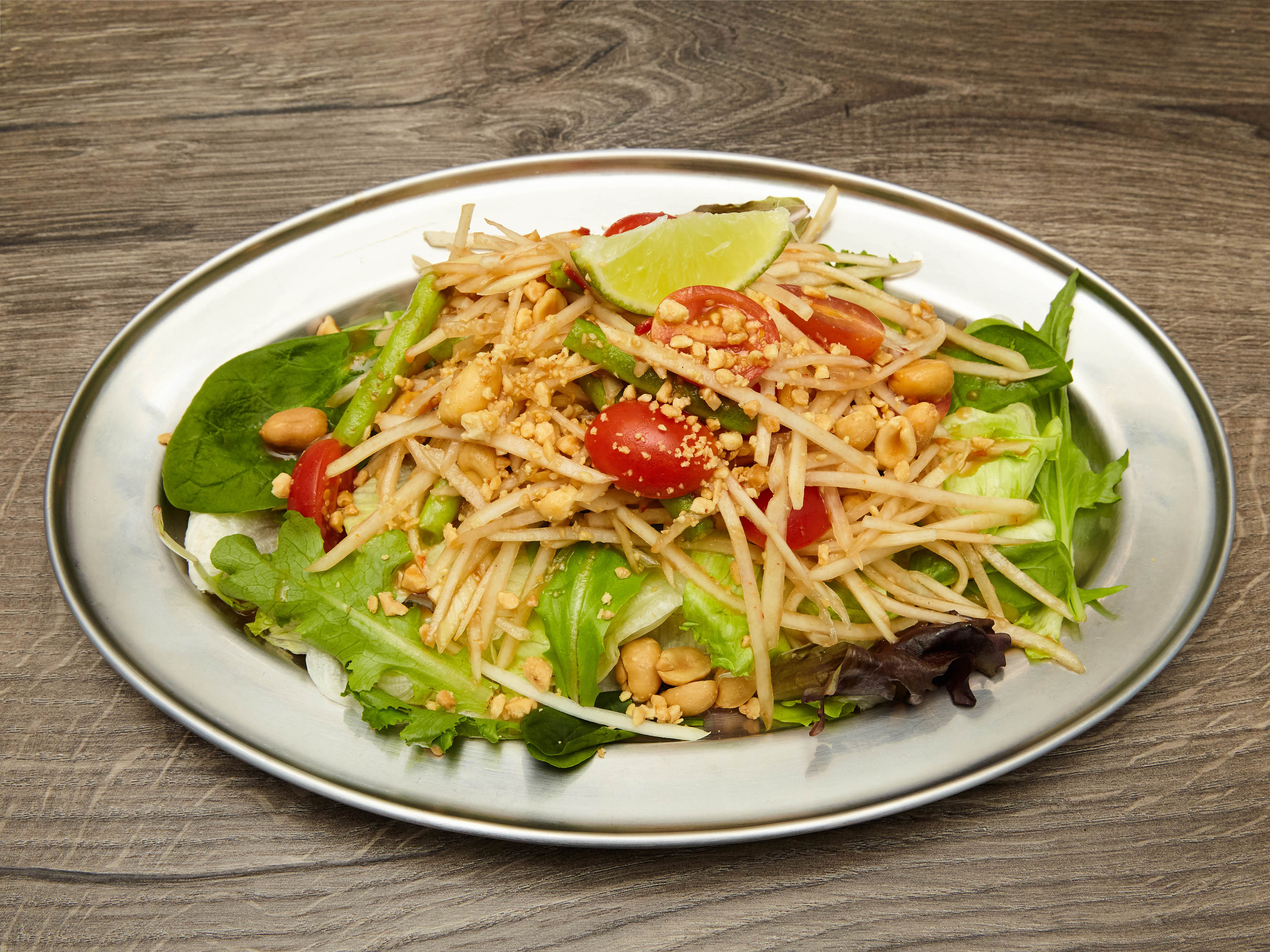 Order B1. Papaya Thai Salad  food online from SUROSS Thai Bistro store, New York on bringmethat.com