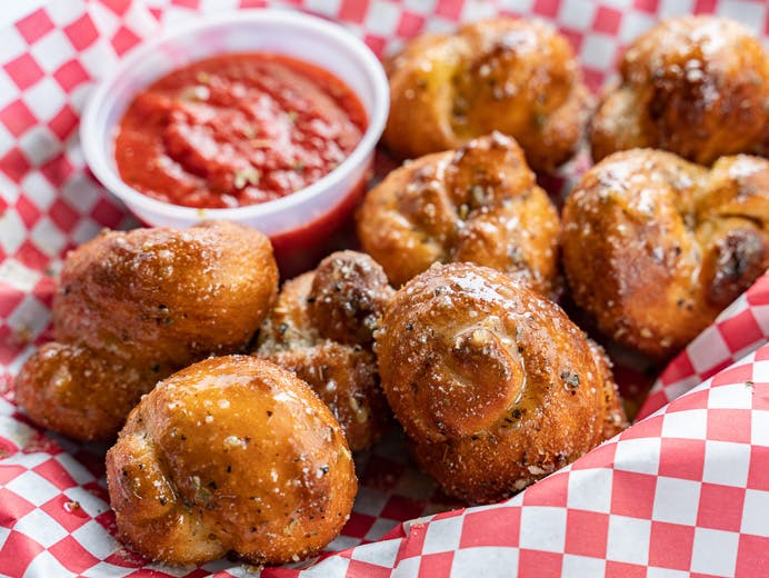 Order Garlic Knots - 8 Pieces food online from Chicho's Pizza store, Chesapeake on bringmethat.com