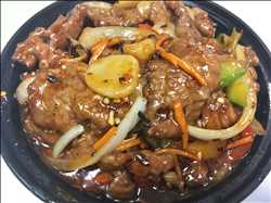 Order Beef in Garlic Sauce food online from Wok One store, Meadows Place on bringmethat.com