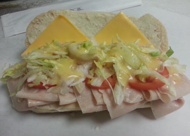 Order Turkey Sub food online from Eagle Pizzeria store, Rochester on bringmethat.com