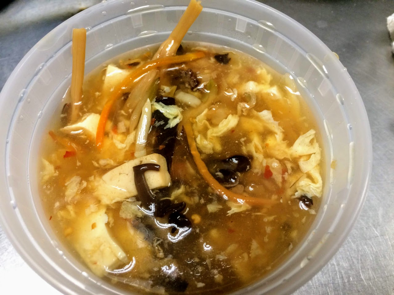 Order 9. Hot and Sour Soup food online from Woodside Kitchen store, Elmhurst on bringmethat.com