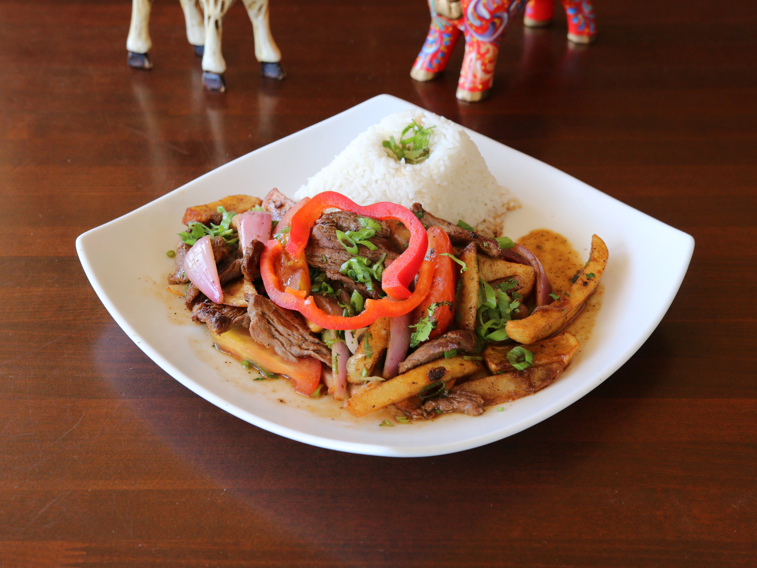 Order Cantina’s Lomo Saltado food online from Inka Cantina store, Fountain Valley on bringmethat.com