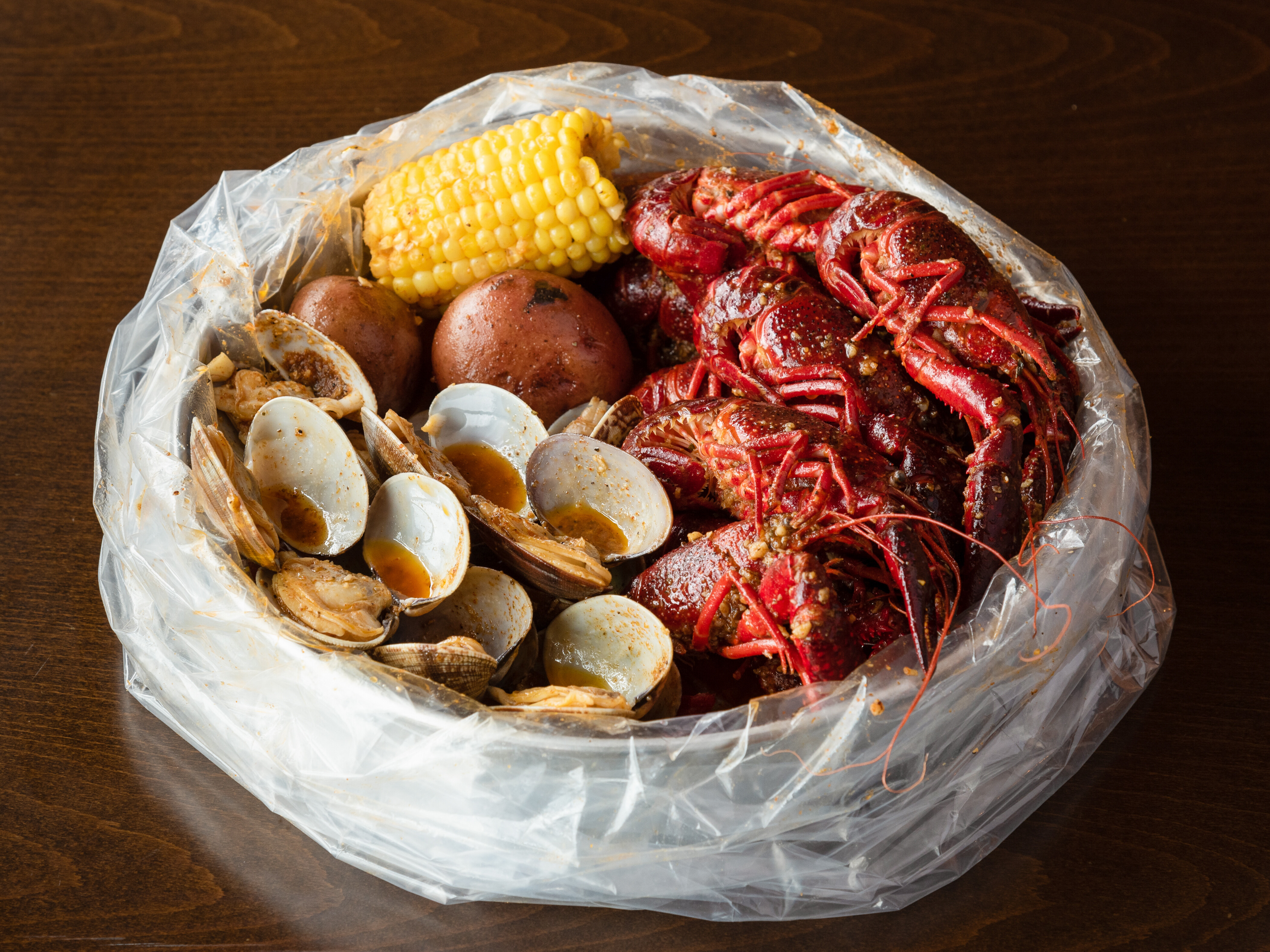 Order 1. Crawfish and Baby Clam Combo food online from Shaking Seafood store, Roslindale on bringmethat.com