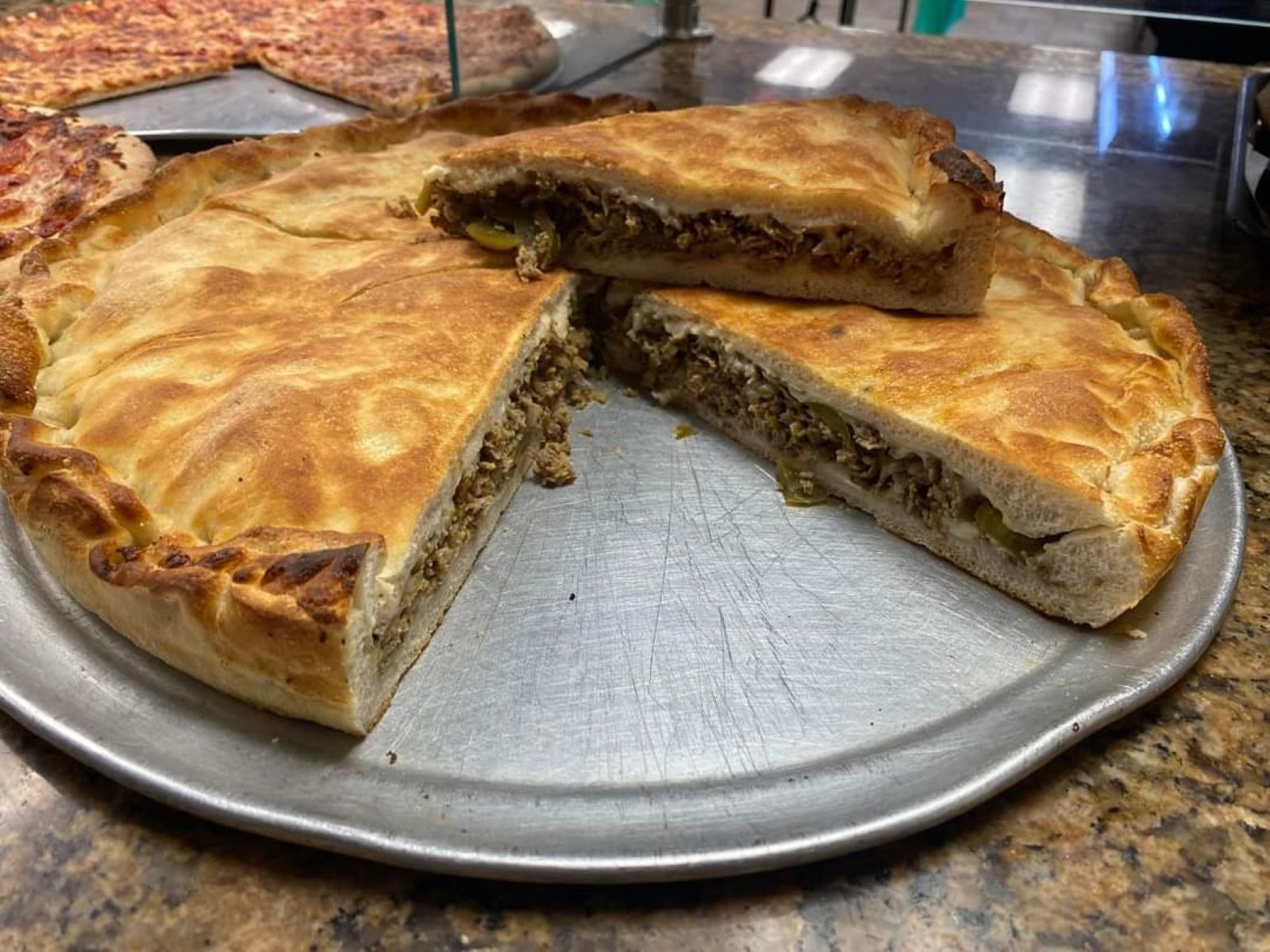 Order Large Cheesesteak Pie food online from Italian Kitchen store, Pennsville on bringmethat.com
