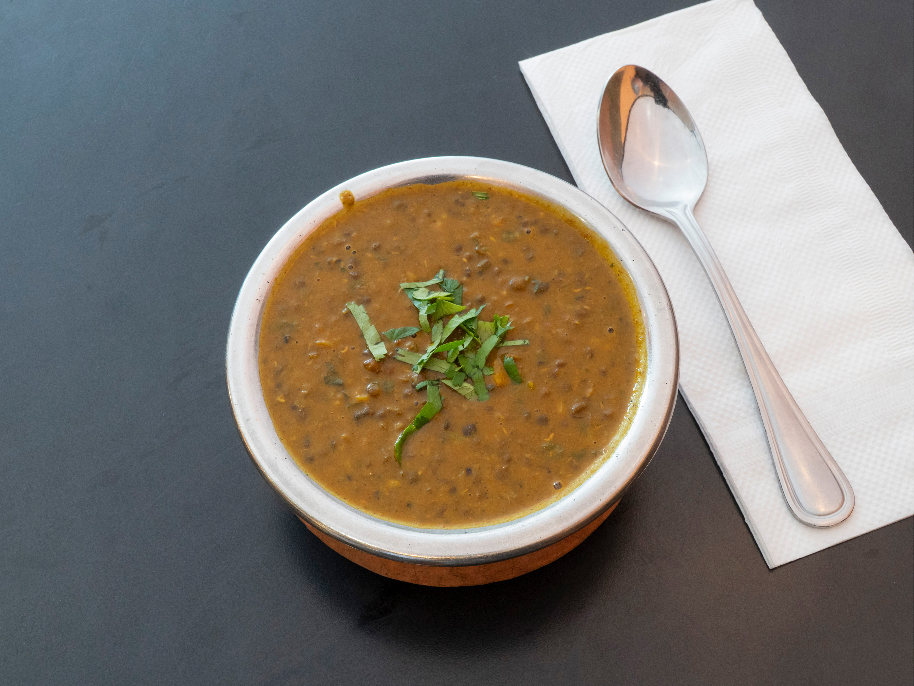 Order Daal Makhni food online from Dhaba Indian Cuisine store, Tracy on bringmethat.com