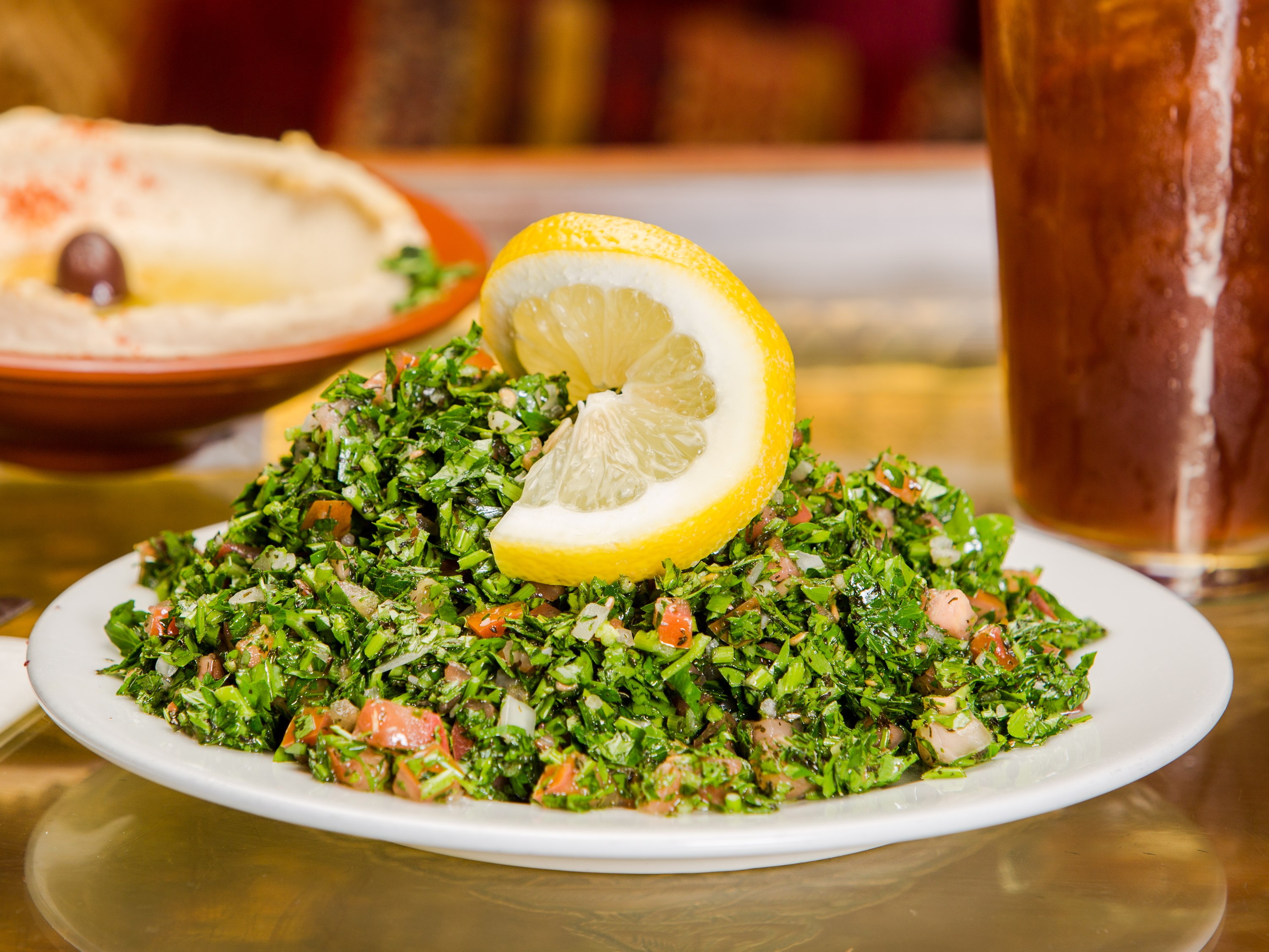 Order Tabouleh Salad food online from Aladdin store, San Diego on bringmethat.com