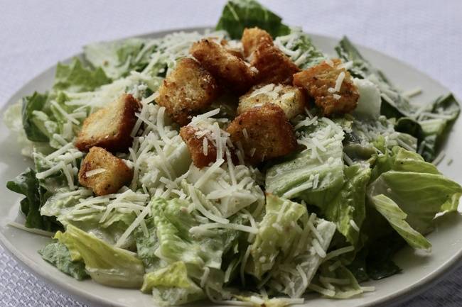 Order Caesar Salad food online from Bambinelli's store, Atlanta on bringmethat.com