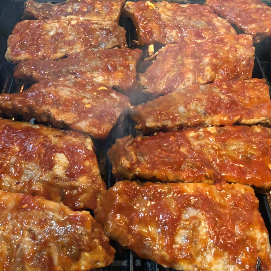 Order Baby Back BBQ Rib - Half Rack food online from Pino's on Main Pizza store, Rockford on bringmethat.com