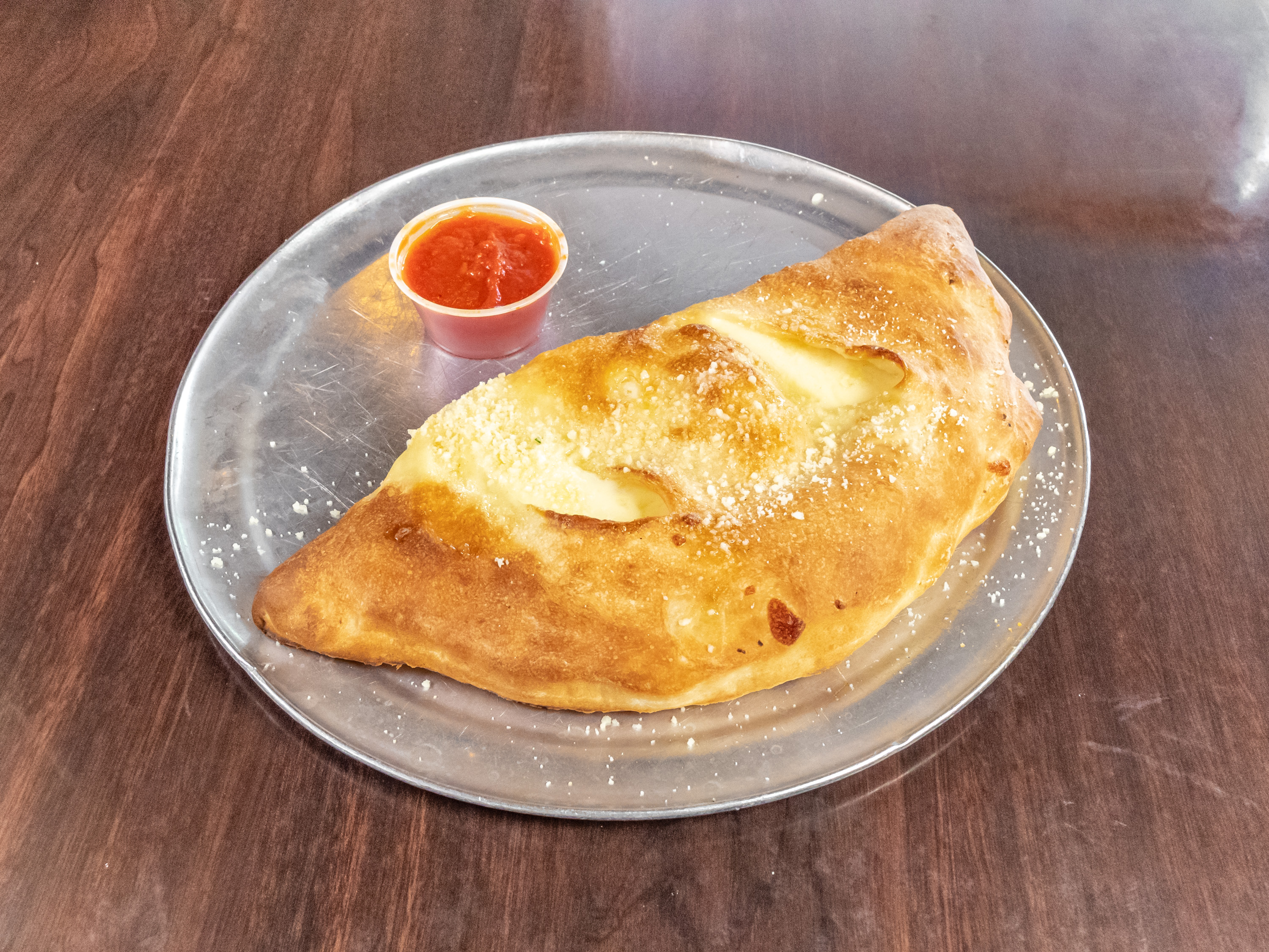 Order Cheese Calzone food online from Sal Gilbert Pizza store, Gilbert on bringmethat.com