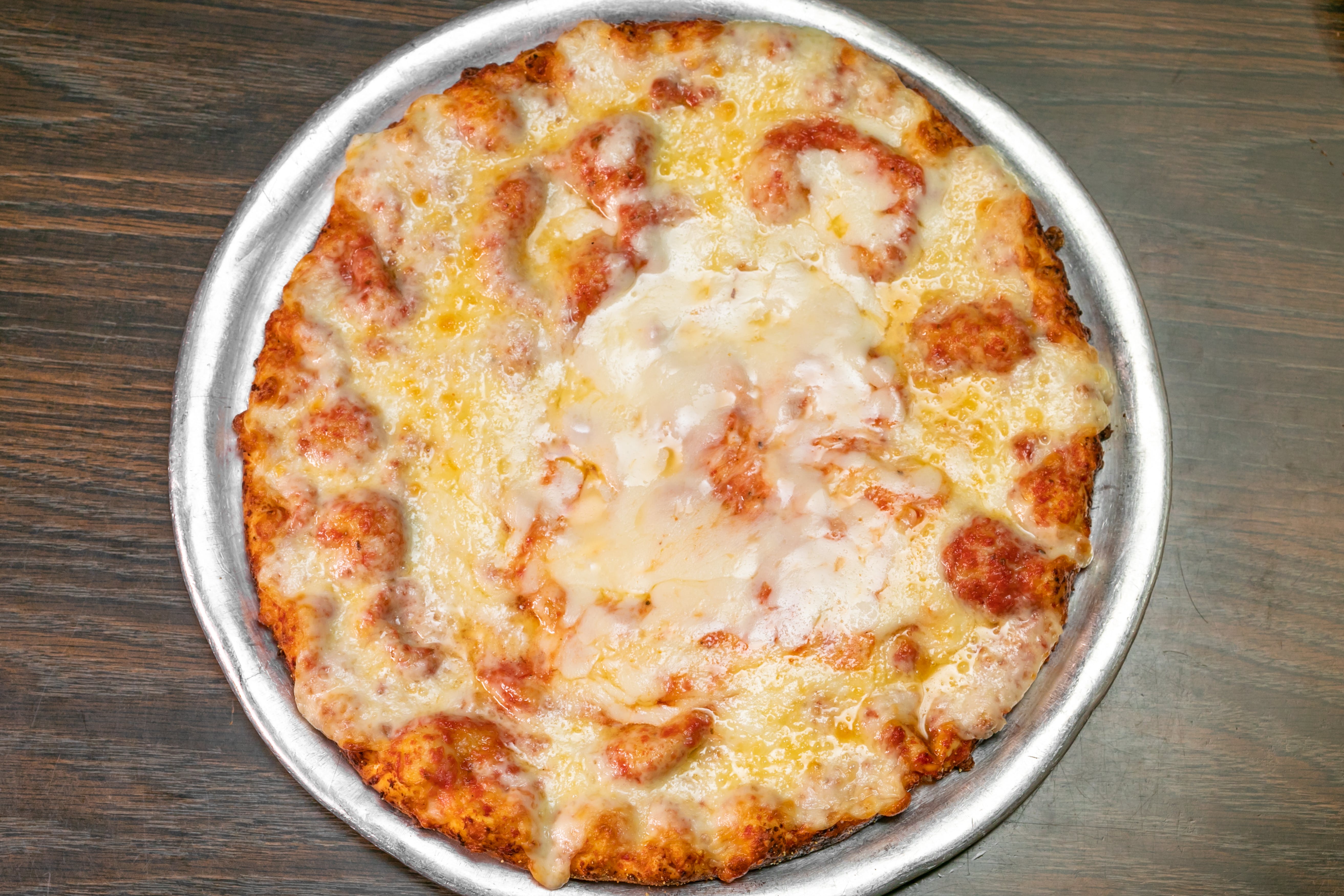 Order 1. Plain Cheese Pizza - Little 7" (Serves 1 Person) food online from Fargo Pizza store, Colorado Springs on bringmethat.com