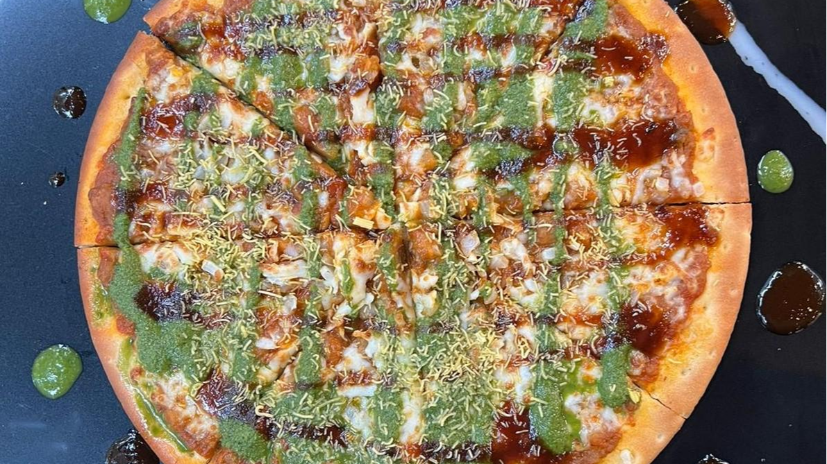 Order Pav Bhaji Pizza food online from Masala Pizza store, Addison on bringmethat.com