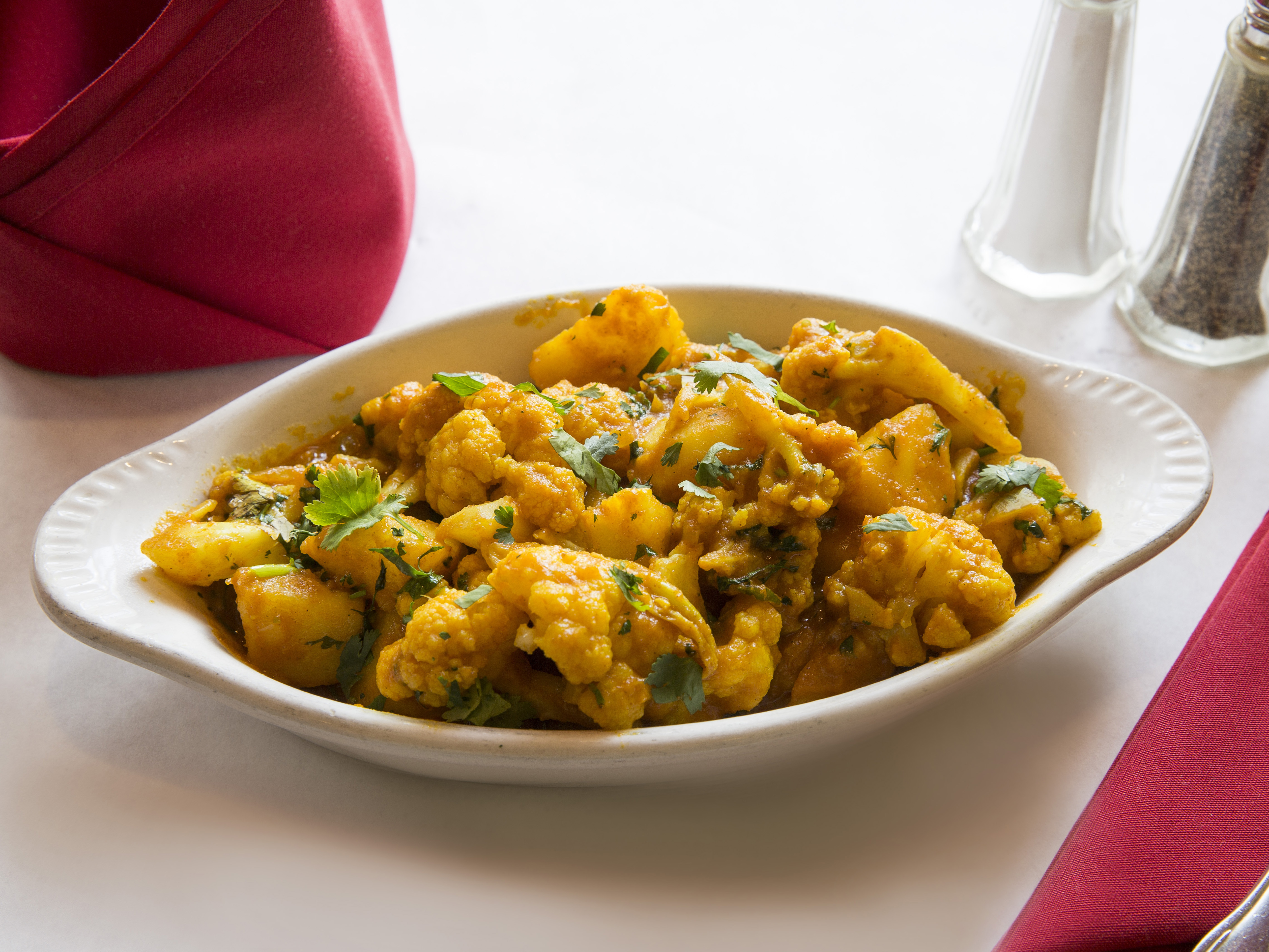 Order Aloo Ghobi food online from Lal Mirch Indian Restaurant store, Agoura Hills on bringmethat.com