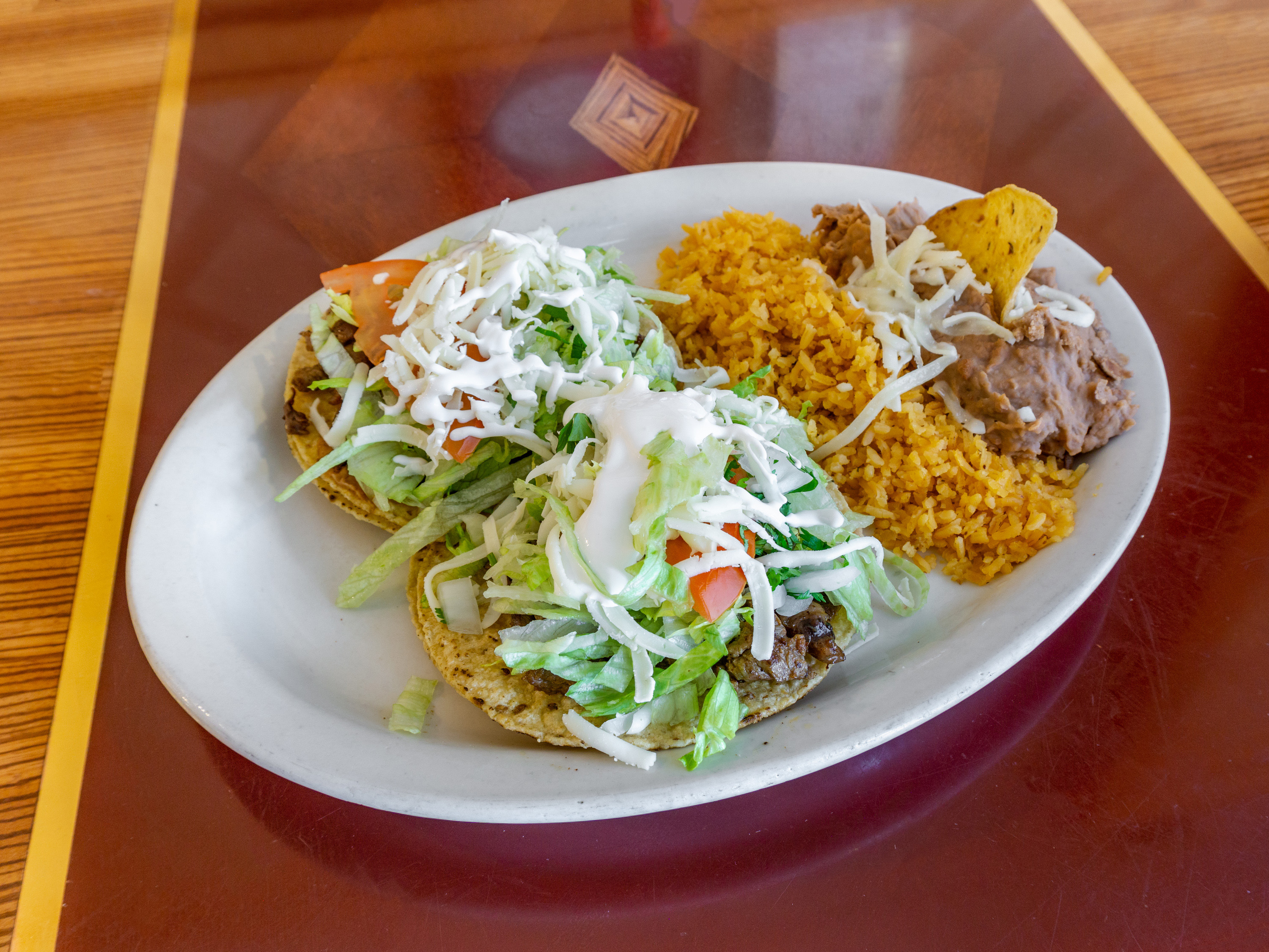 Order Tostada food online from El Ranchito store, Chicago on bringmethat.com