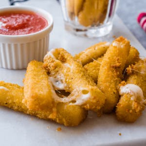 Order Mozzarella Sticks - 5 Pieces food online from The Garlic Knot store, Lakewood on bringmethat.com
