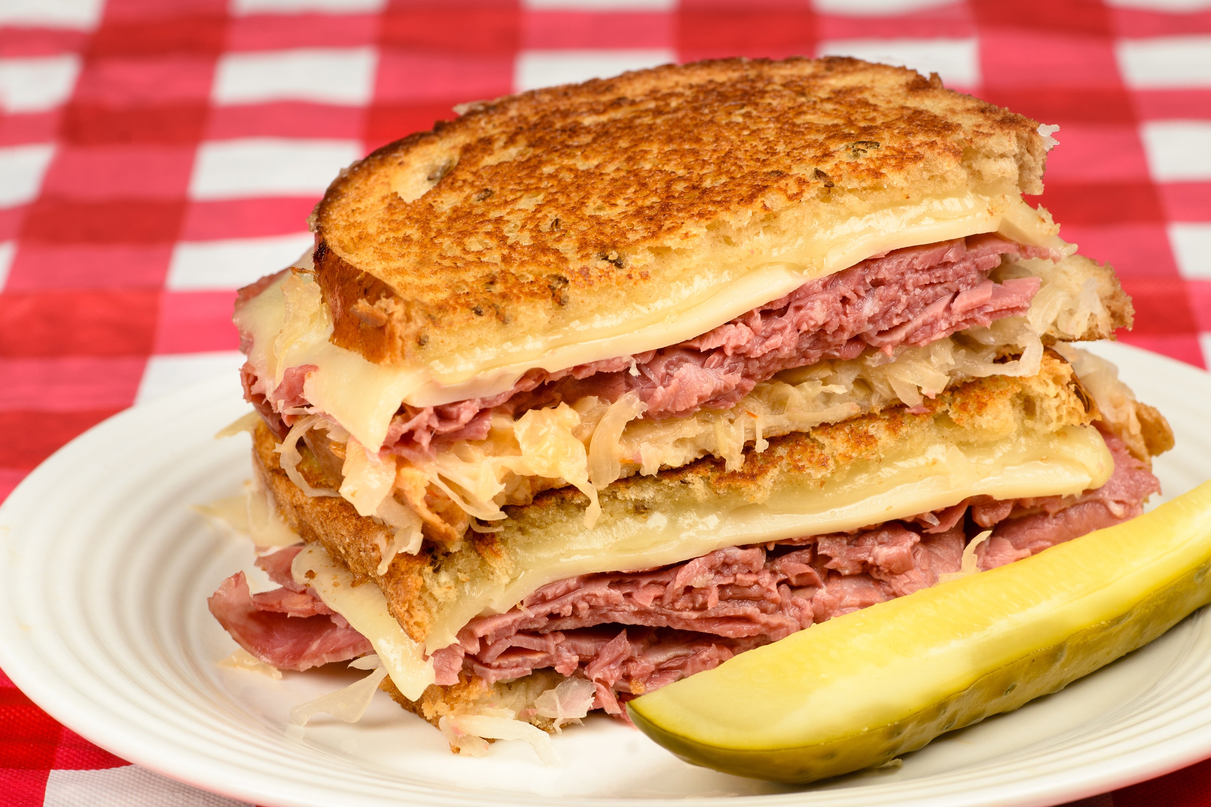 Order Corned Beef Reuben Sandwich food online from Paradise Pizza & Grill store, Southington on bringmethat.com