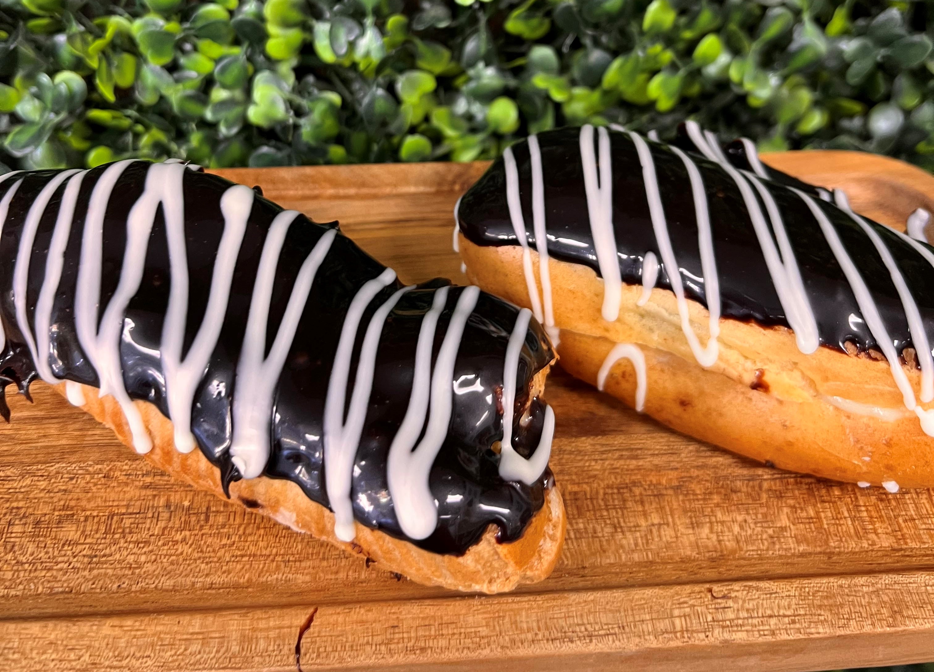 Order Eclair Chocolate food online from Ossys Bakery store, Glendale on bringmethat.com