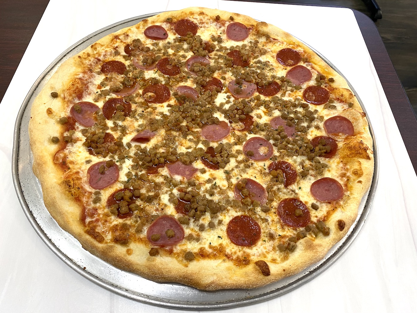 Order Meat Lovers Specialty Pizza (18" XL) food online from Heavenly Crust Pizza store, North Richland Hills on bringmethat.com