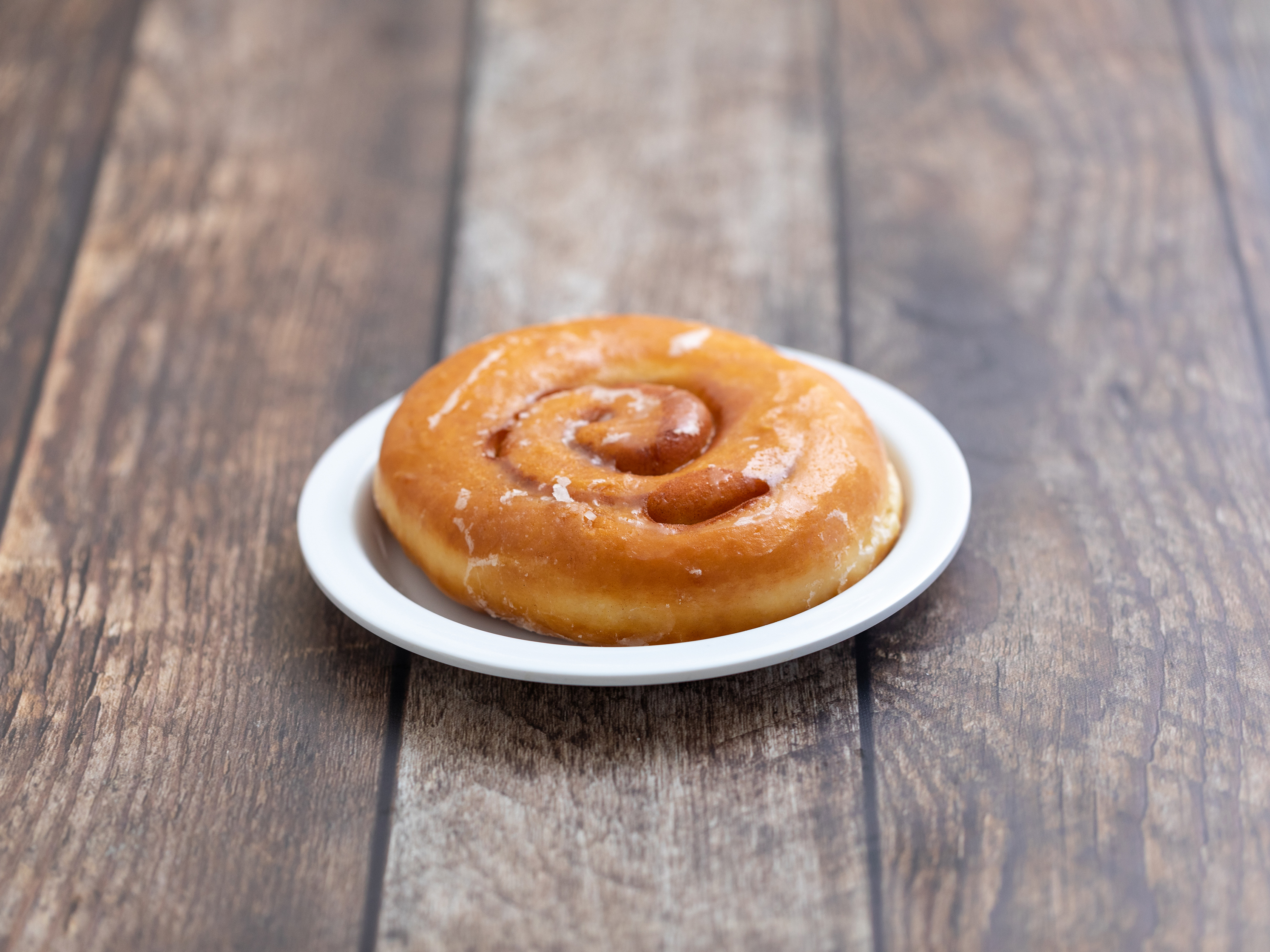 Order Cinnamon Roll food online from Rolling Pin Donuts store, San Bruno on bringmethat.com
