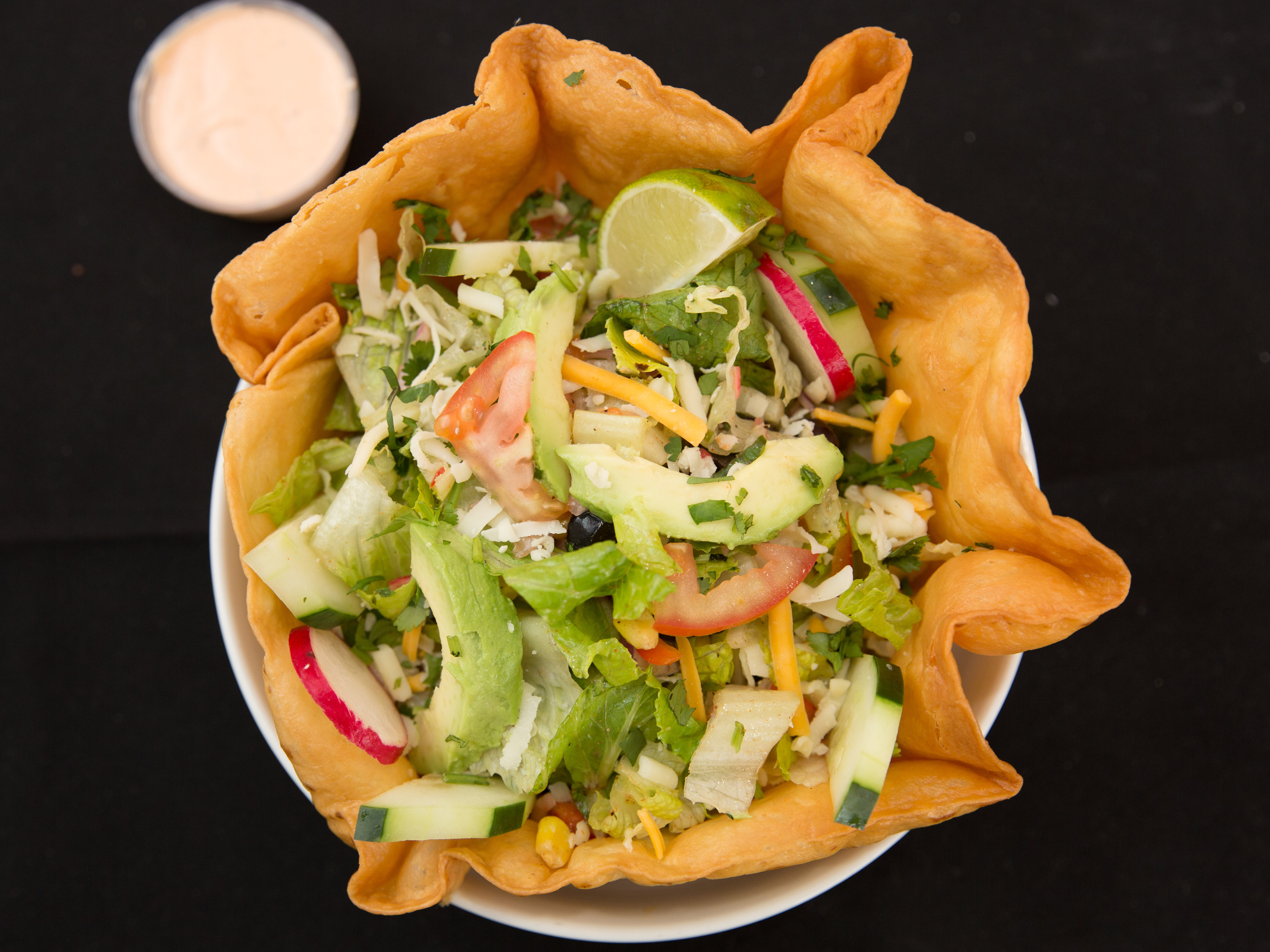 Order Taco Salad food online from Oaxaca Pizzeria & Taqueria store, Bridgeport on bringmethat.com