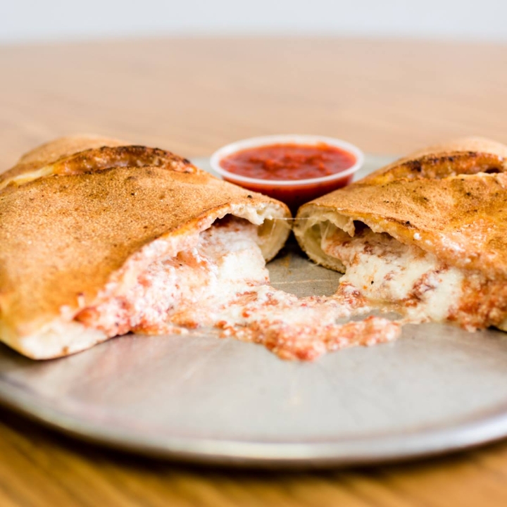 Order Large CALZONE food online from Pasquale's Pizzeria store, Dravosburg on bringmethat.com