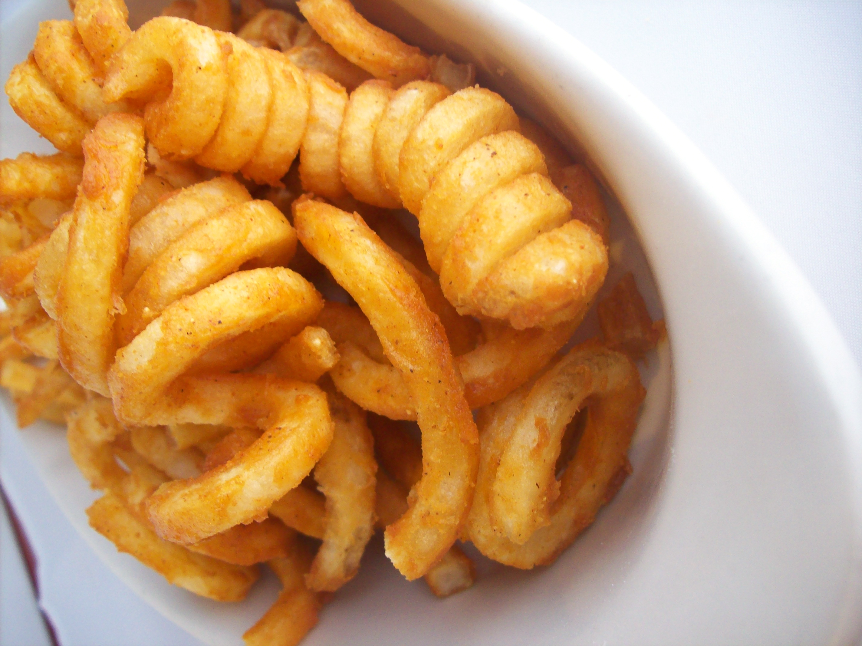 Order Curly Fries food online from Pizza Shuttle store, Milwaukee on bringmethat.com