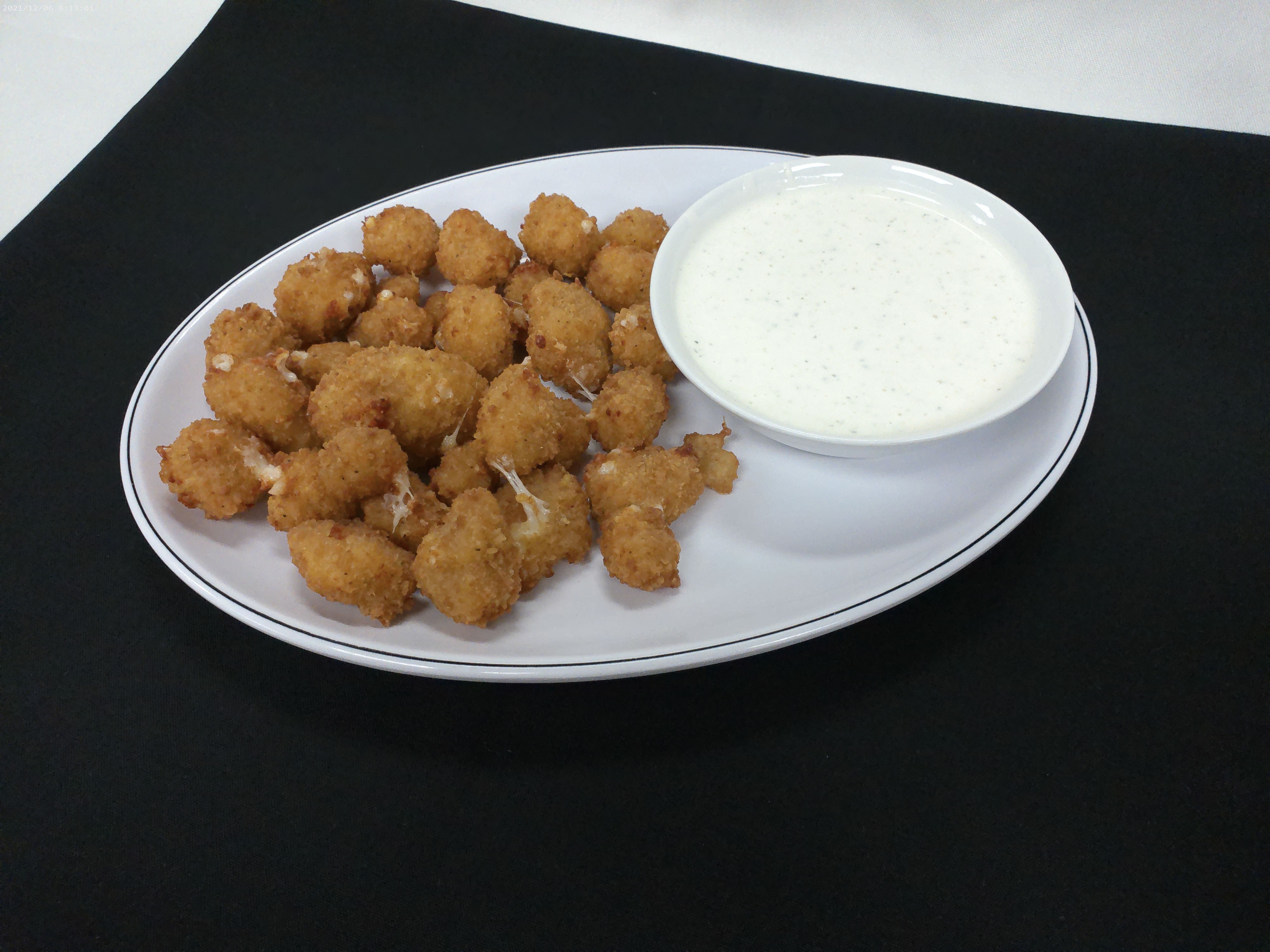 Order Spicy Cheddar Cheese Curds food online from Windy City Pub store, Leawood on bringmethat.com
