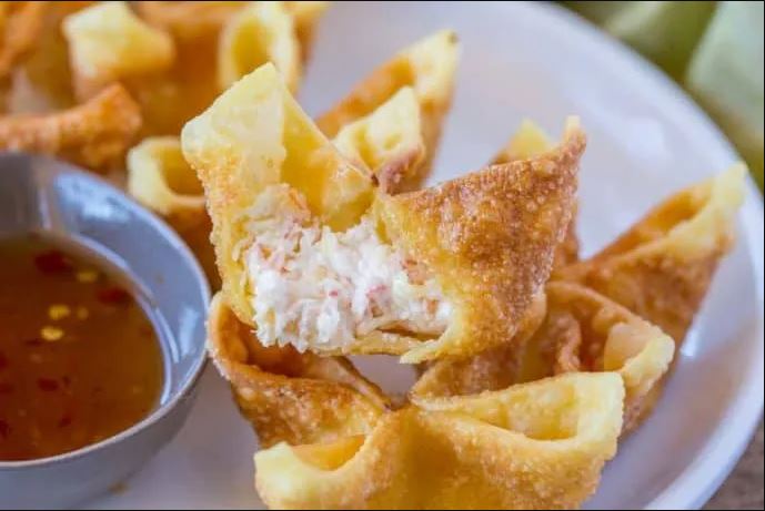Order A12. Crab Rangoon (5pcs) food online from Pho Vieng store, Fort Worth on bringmethat.com