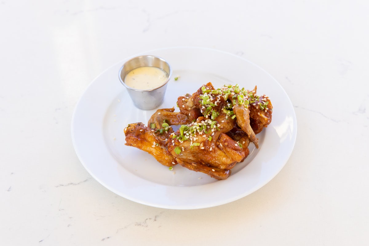 Order STICKY CHICKEN WINGS [GF] food online from Bellagreen store, Houston on bringmethat.com