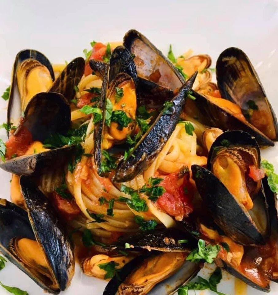 Order Mussels Over Pasta - Entree food online from Mario & Franks II store, Fieldsboro on bringmethat.com