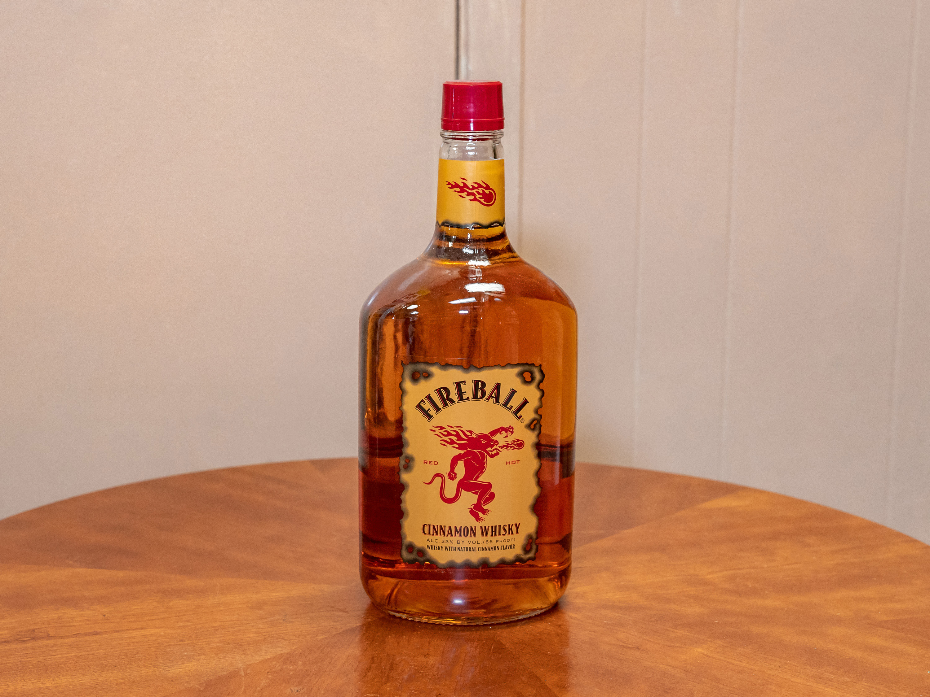 Order Fireball, 1.75 Liter Whiskey food online from Jose's Wines & Liquors store, Valley Cottage on bringmethat.com