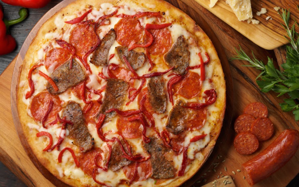 Order Works Pizza - Medium 12" food online from Russo New York Pizzeria store, Houston on bringmethat.com