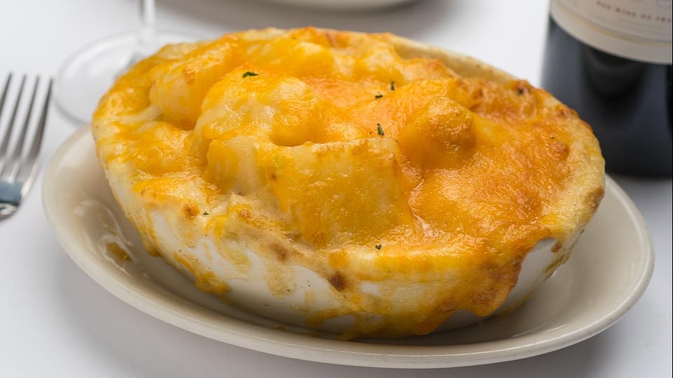 Order Smoked Gouda & Bacon Au Gratin Potatoes food online from Morton The Steakhouse store, King of Prussia on bringmethat.com