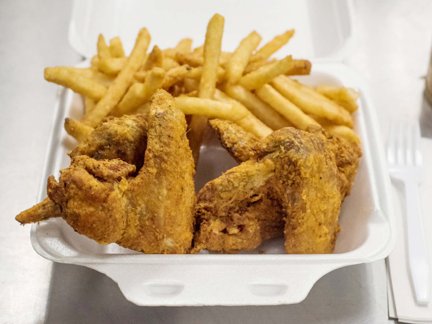 Order 4 Whole Fried Chicken Wings with Fries food online from Dash Seafood store, Baltimore on bringmethat.com