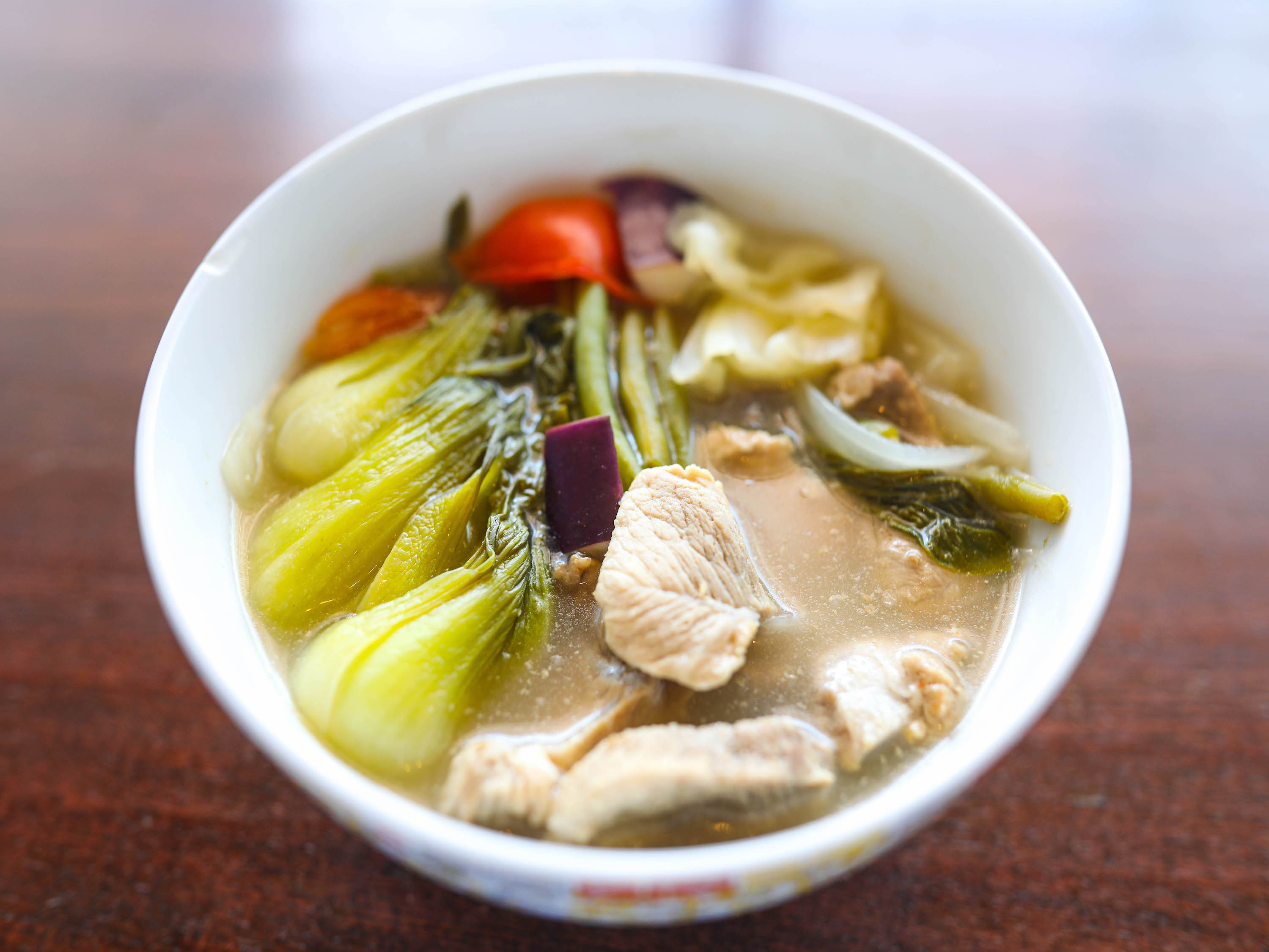 Order Sinigang na Baboy (pig) Soup food online from Mateo Kitchen & Catering store, Sergeant Bluff on bringmethat.com