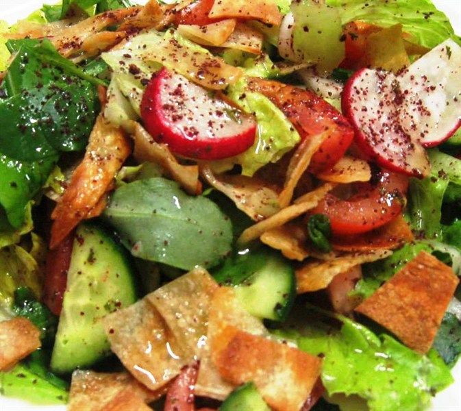 Order  Fattoush Plate food online from Nour Cafe store, Revere on bringmethat.com