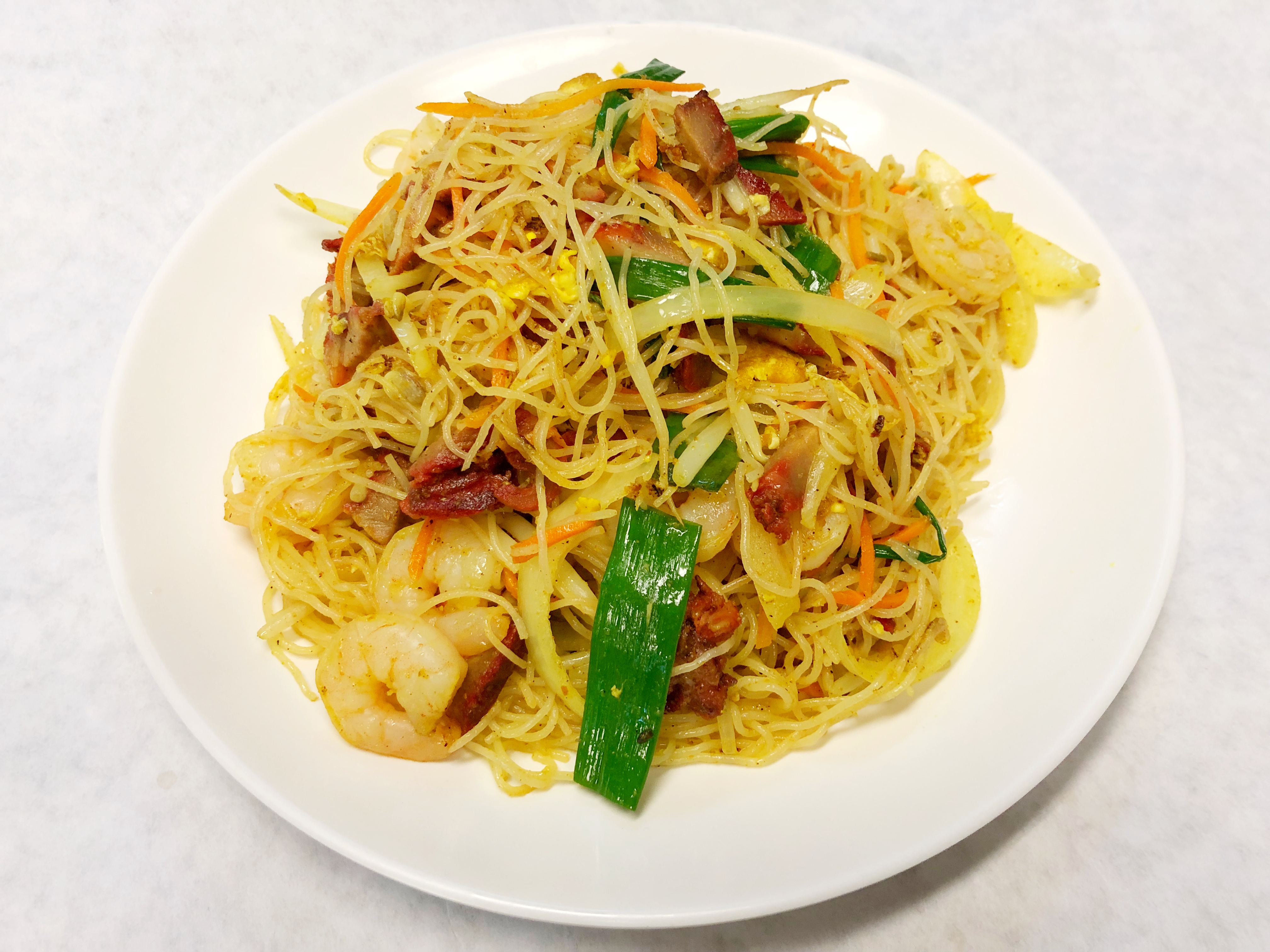 Order Singapore Rice Noodle food online from House of Pho store, Hoffman Estates on bringmethat.com