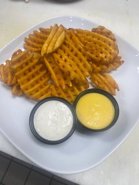 Order Waffle Fries food online from Burger Village store, Hicksville on bringmethat.com