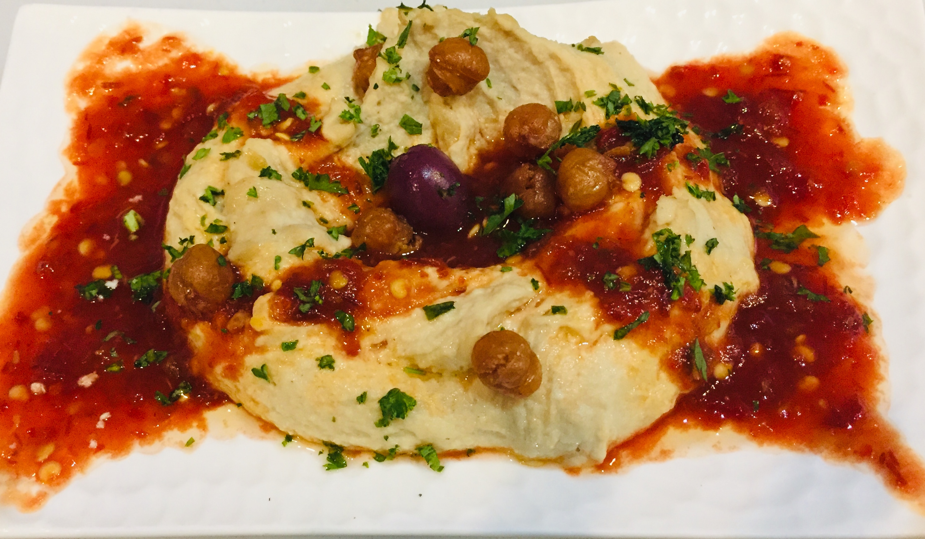 Order Harissa Hummus (Spicy) food online from Moussaka Mediterranean Kitchen store, San Leandro on bringmethat.com
